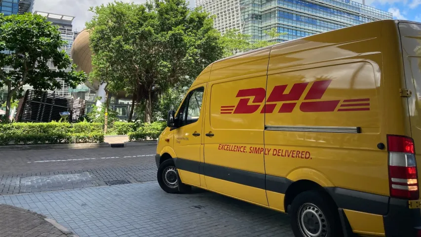DHL truck parked on the side of the road