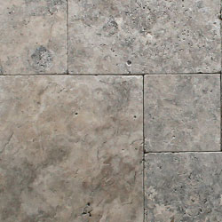 A close up of a gray granite counter top
