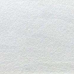 A close up of a gray granite counter top