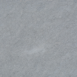 A close up of a gray granite counter top