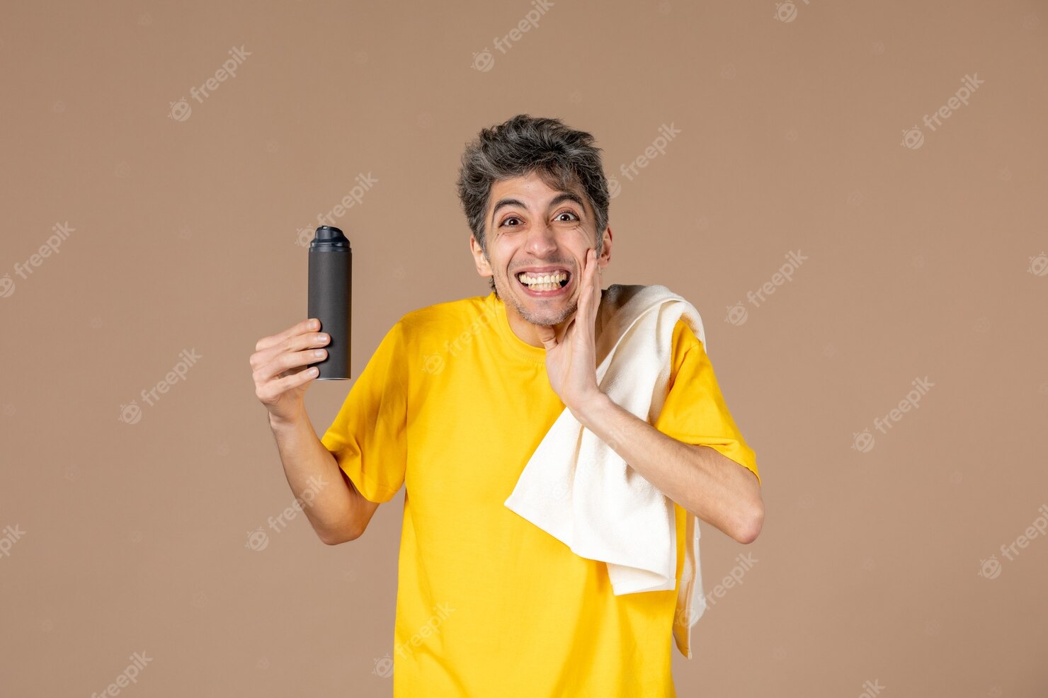 front-view-young-male-with-foam-towel-preparing-shave-his-face-pink-background 140725-68427