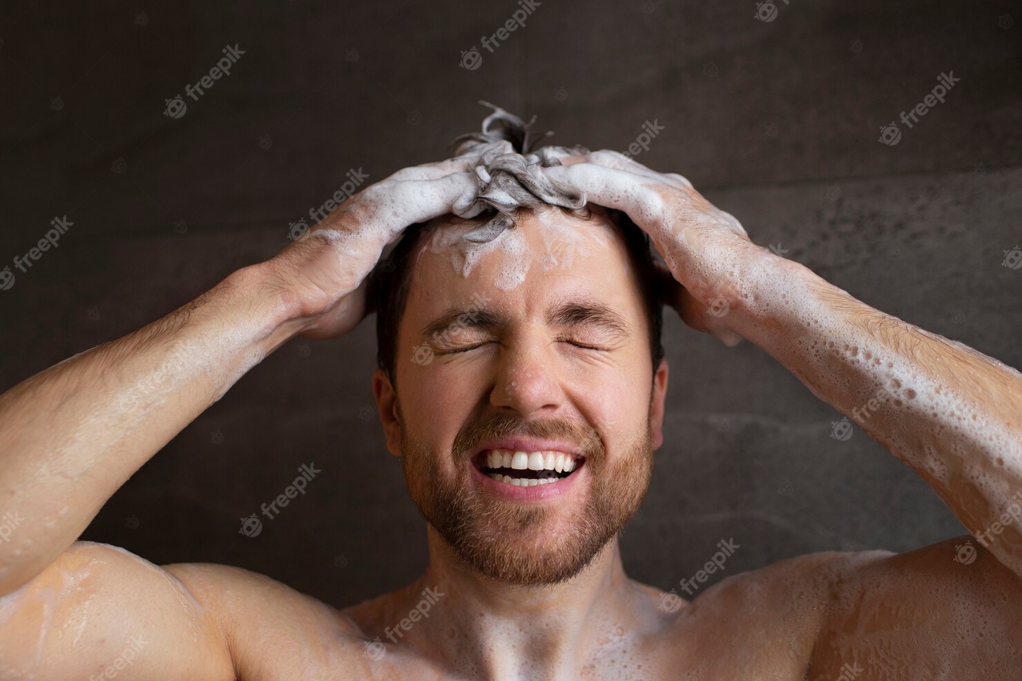 front-view-man-washing-hair 23-2150323135