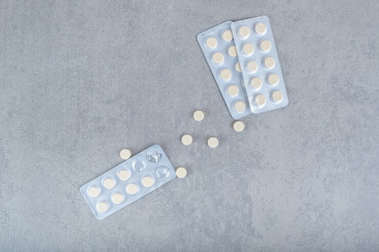 lot-blisters-with-white-pills-gray-surface 114579-73632