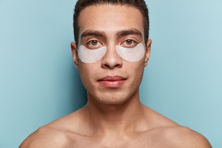 portrait-young-man-with-eye-patches 273609-22134