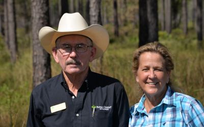 Doug and Teresa Moore on their property in Florida. Photo courtesy of Chris Demers.