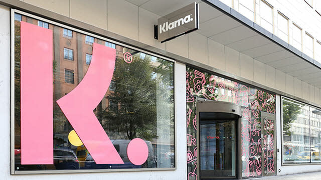 Image of the Klarrna entrance today with big pink K on the window