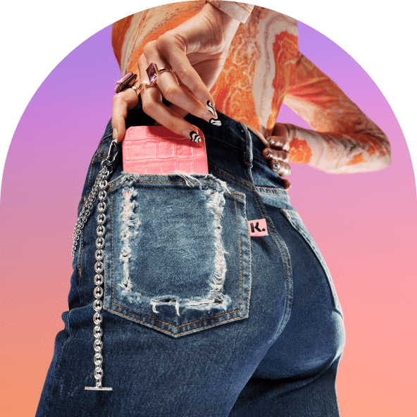 Phone in jeans back pocket with Klarna logo