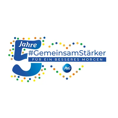 Ein Herz aus bunten Punkten mit dem P&G Logo und dem Text „5 Jahre #GemeinsamStärker“