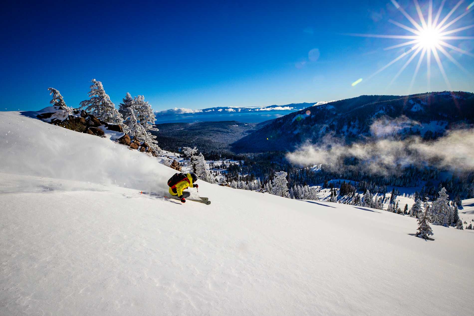 Person skiing down hill.