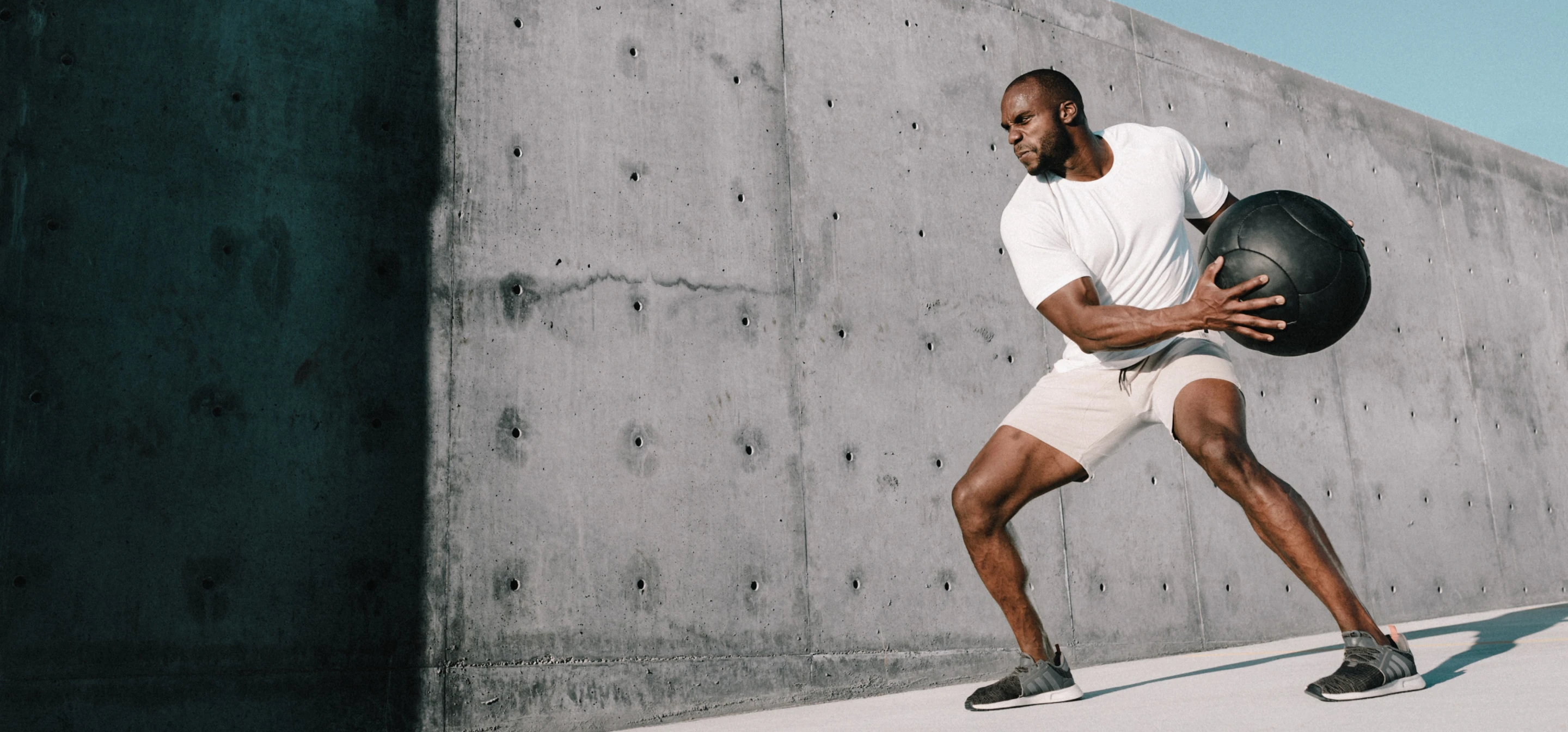 Image of man working out with medicine ball