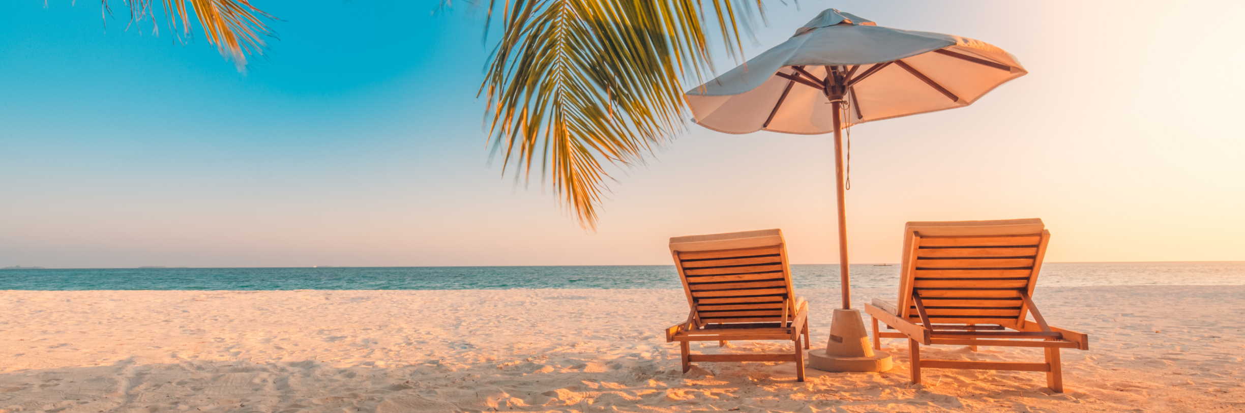Two chairs on a beach