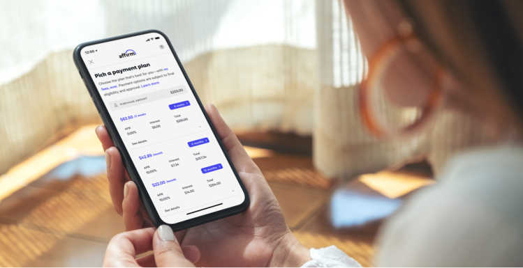 Woman looking at Affirm on her phone