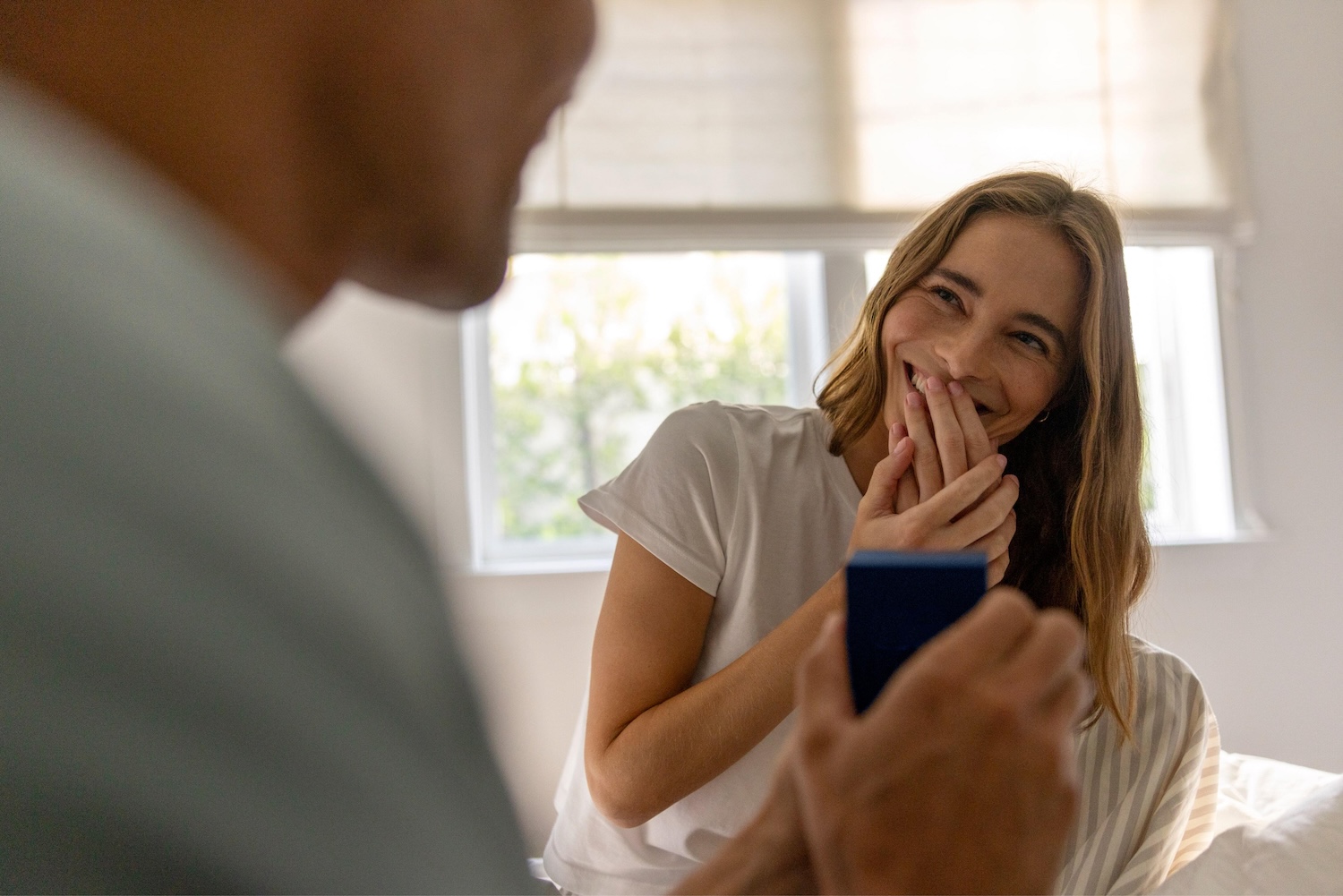 Couple using Affirm Money Account mobile banking app to manage finances together