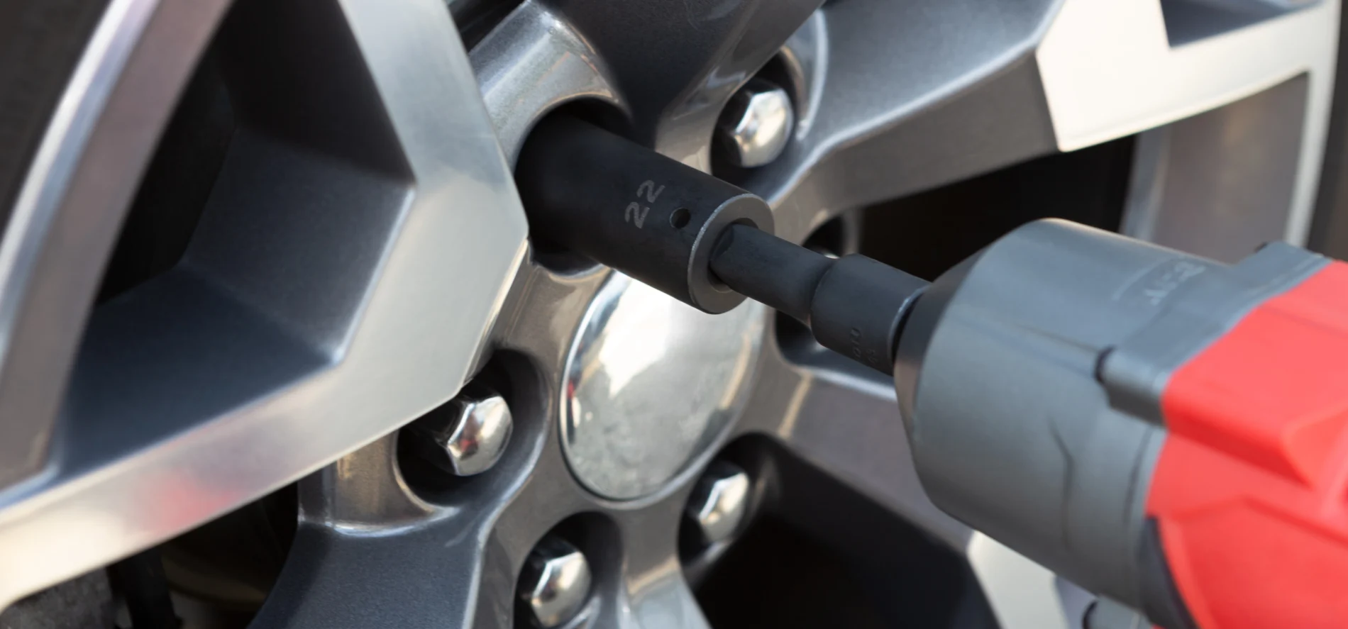 Image of drill on a tire lug-nut