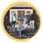 Image of group of people throwing confetti on a porch