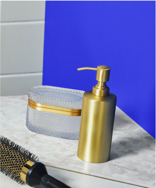 image of soap dispenser and hair roller against tile