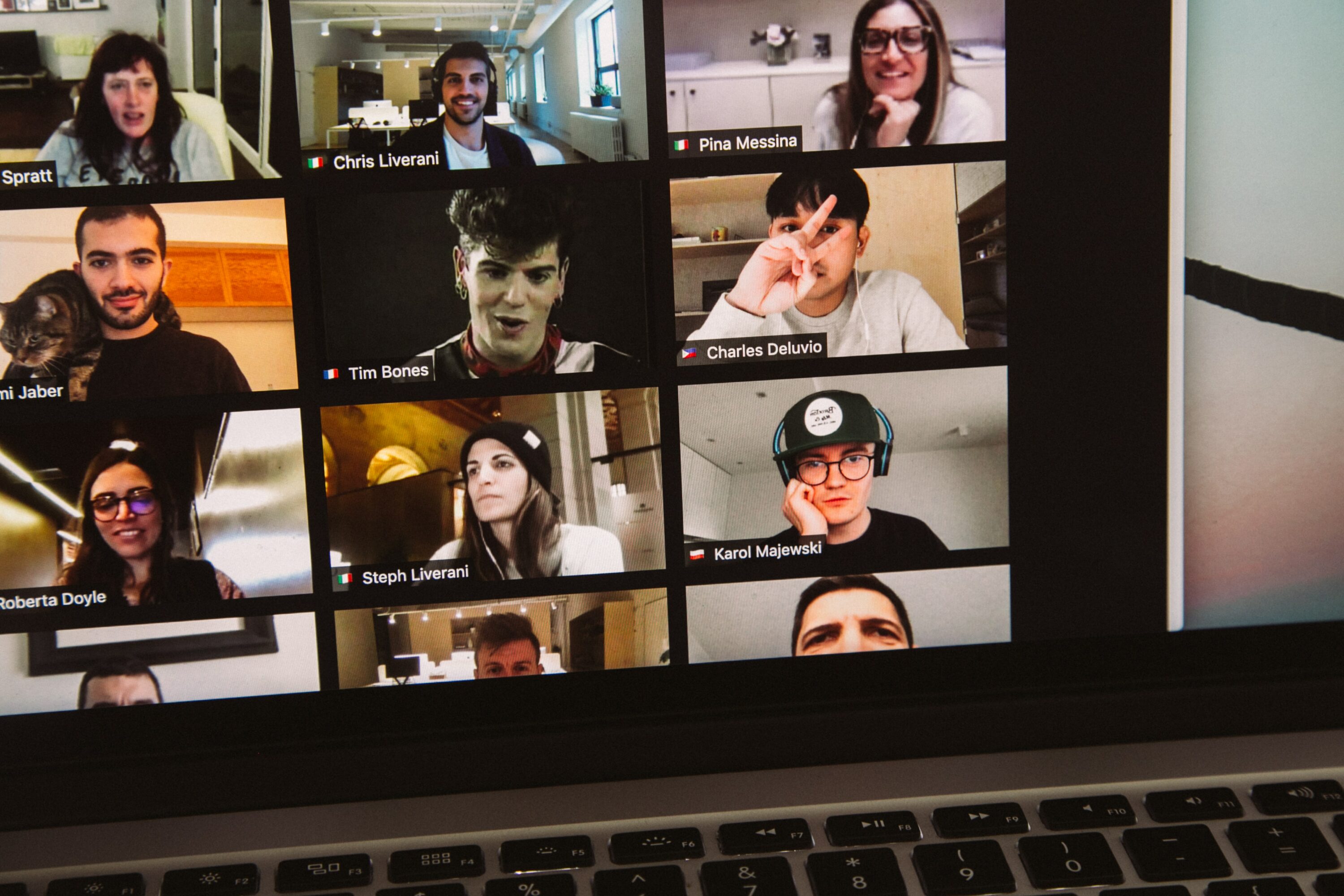 laptop screen with with people in a video call