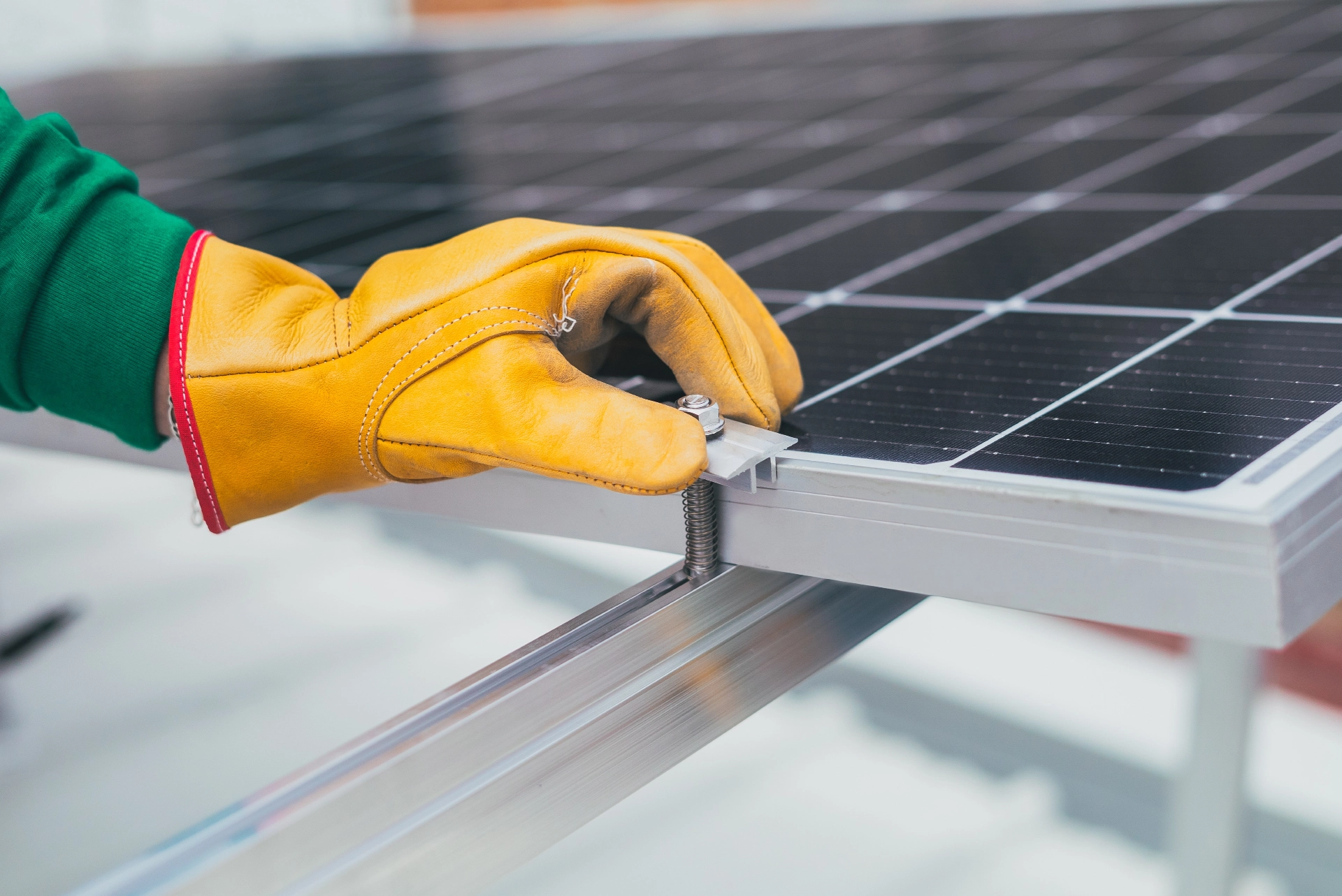 screwing on solar panel