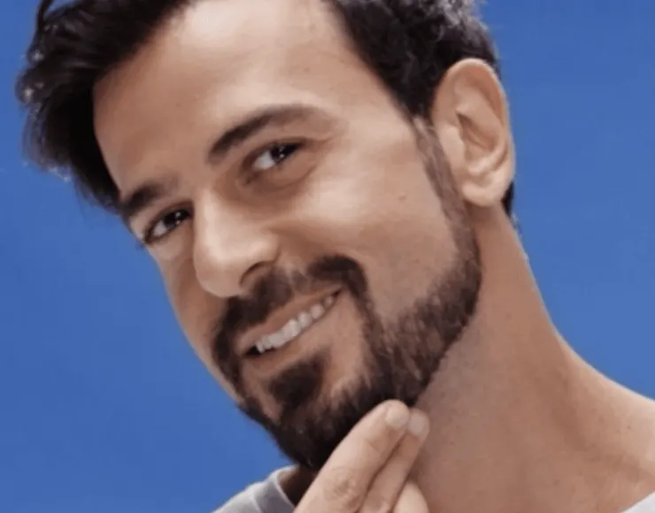 Man with a short boxed beard, suitable for long face shapes 