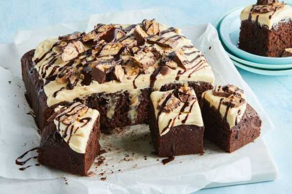 Snickers and peanut butter caramel poke cake
