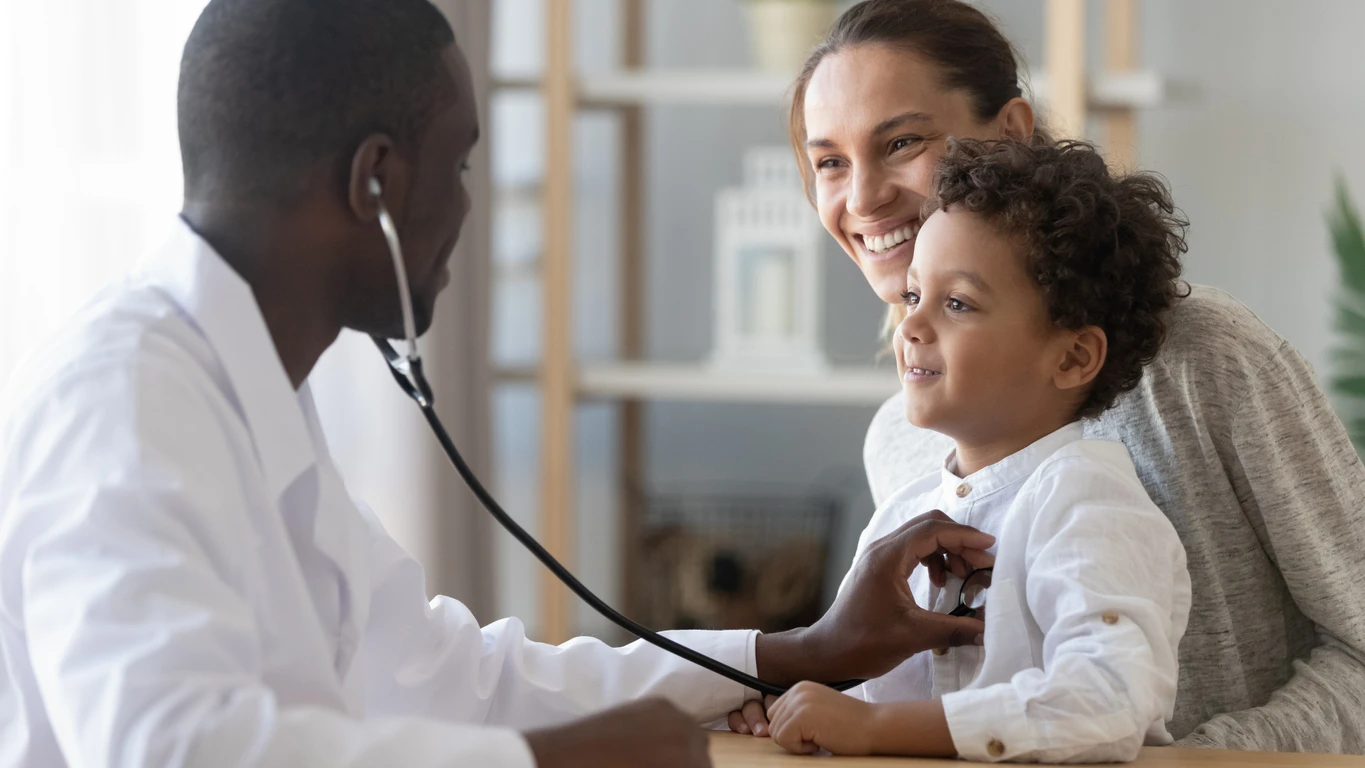 child and mother at a family doctor visit 