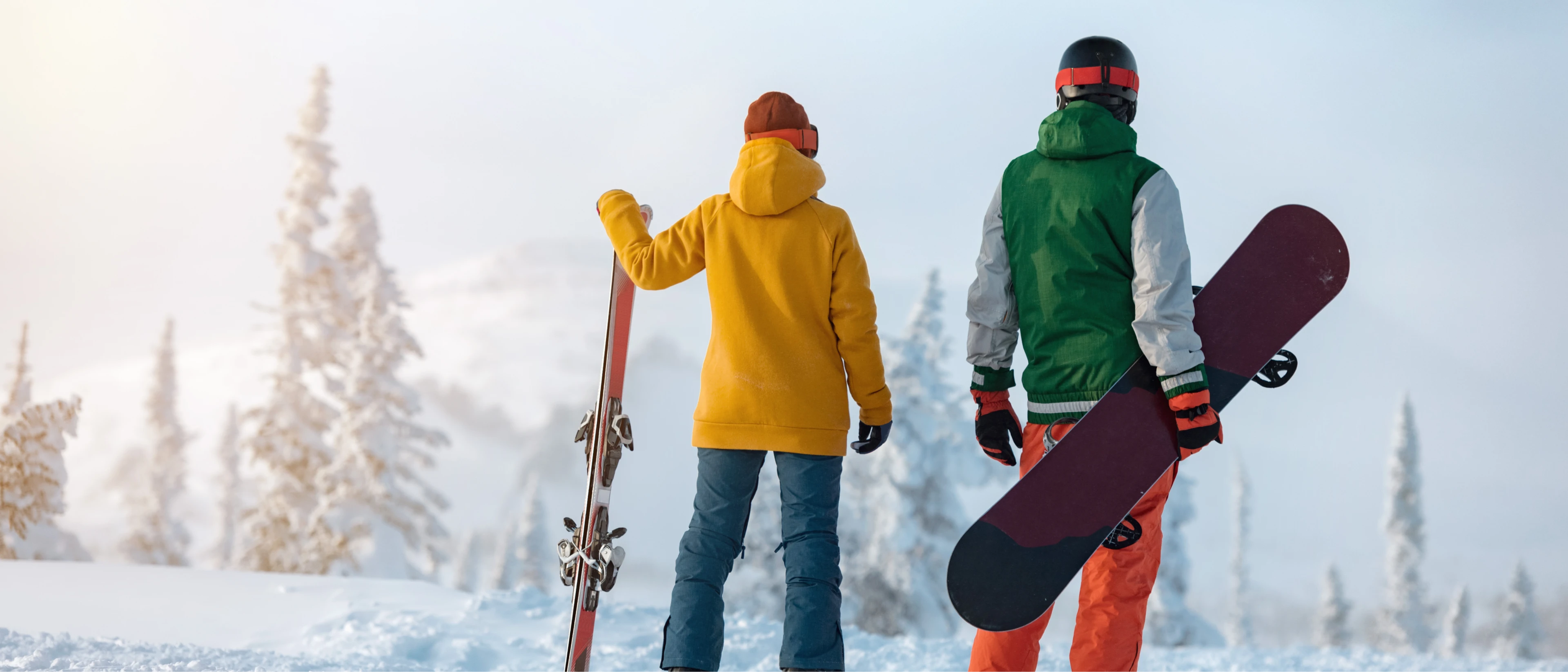 lifestyle-skier-snowboarder-standing-at-ski-resort-1306636234