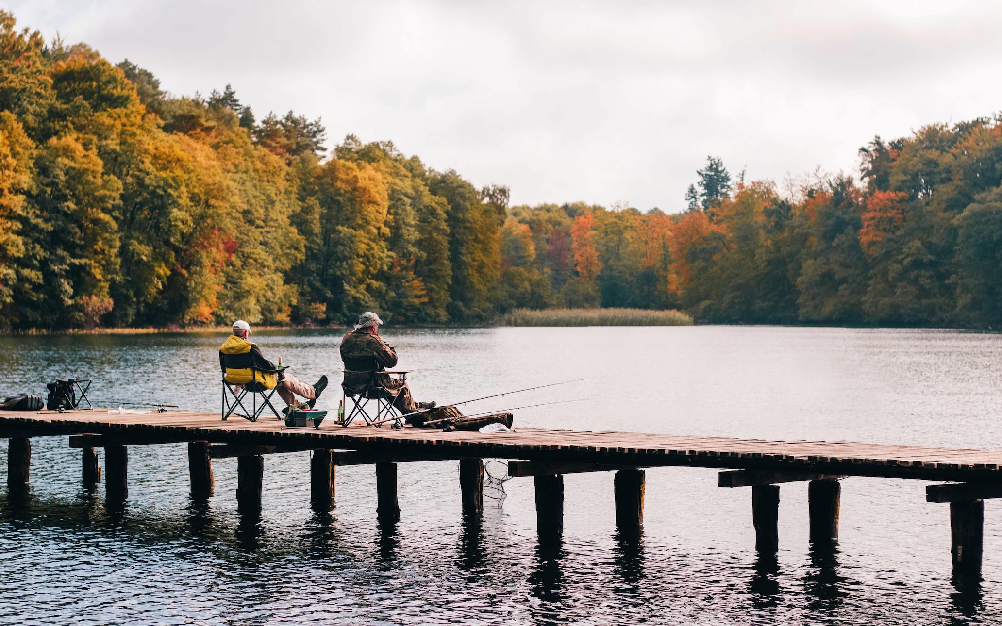 Father and Son Fishing on a Dock