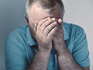 Older man with diabetes showing fear and stress