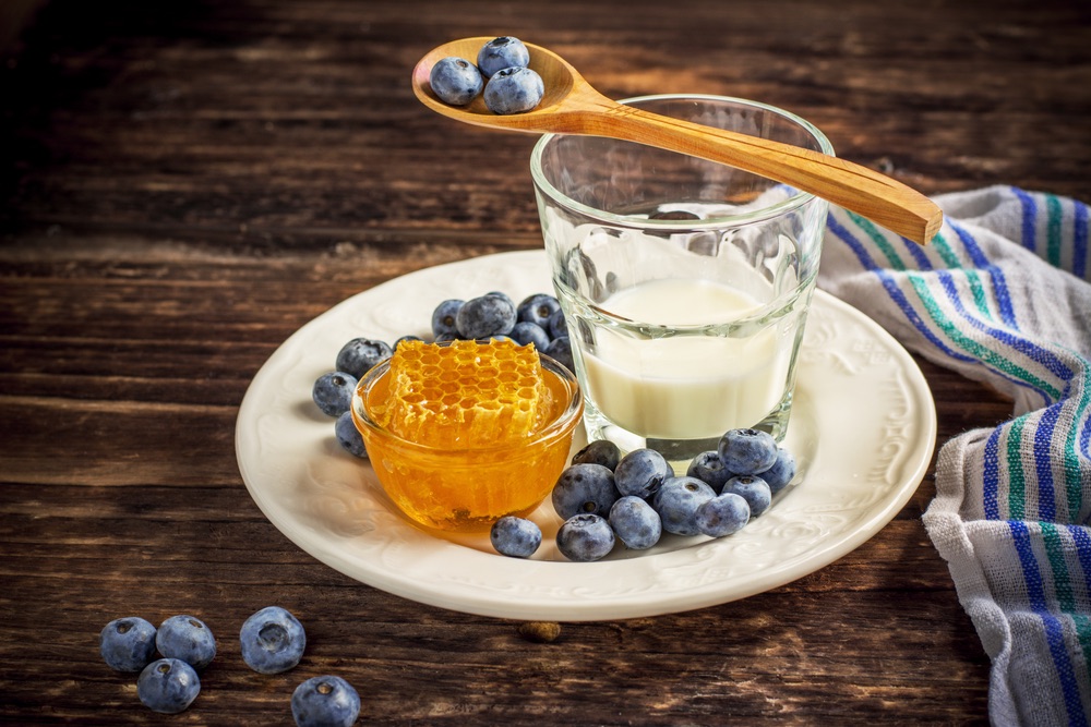 Milk, fruit and honey contain types of carbohydrates