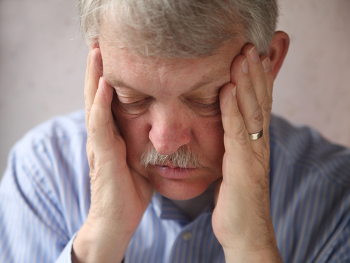 Older man with diabetes showing fear and stress
