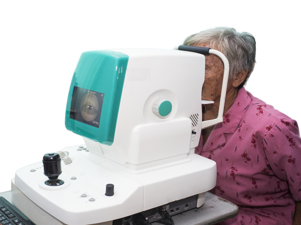 elderly woman with type 2 diabetes having an eye exam to check for diabetic retinopathy