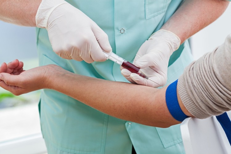 Man with type 2 diabetes getting a blood test