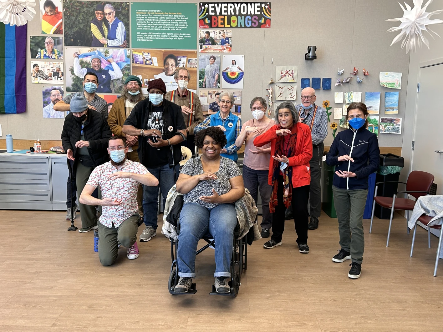 LGBTQ+ seniors practicing Tai Chi for arthritis in the Bay Area at the On Lok 30th Street Senior Center. 