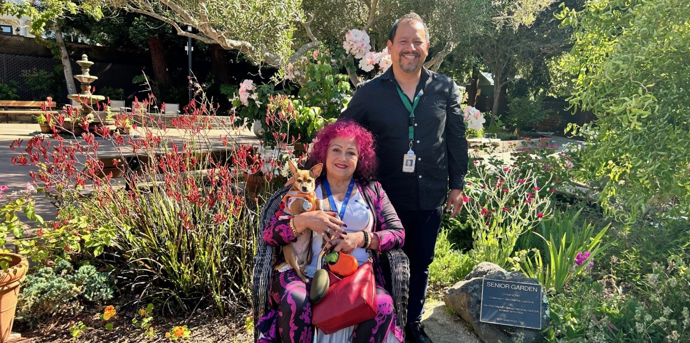 Photo of Patricia sitting in community garden at senior center