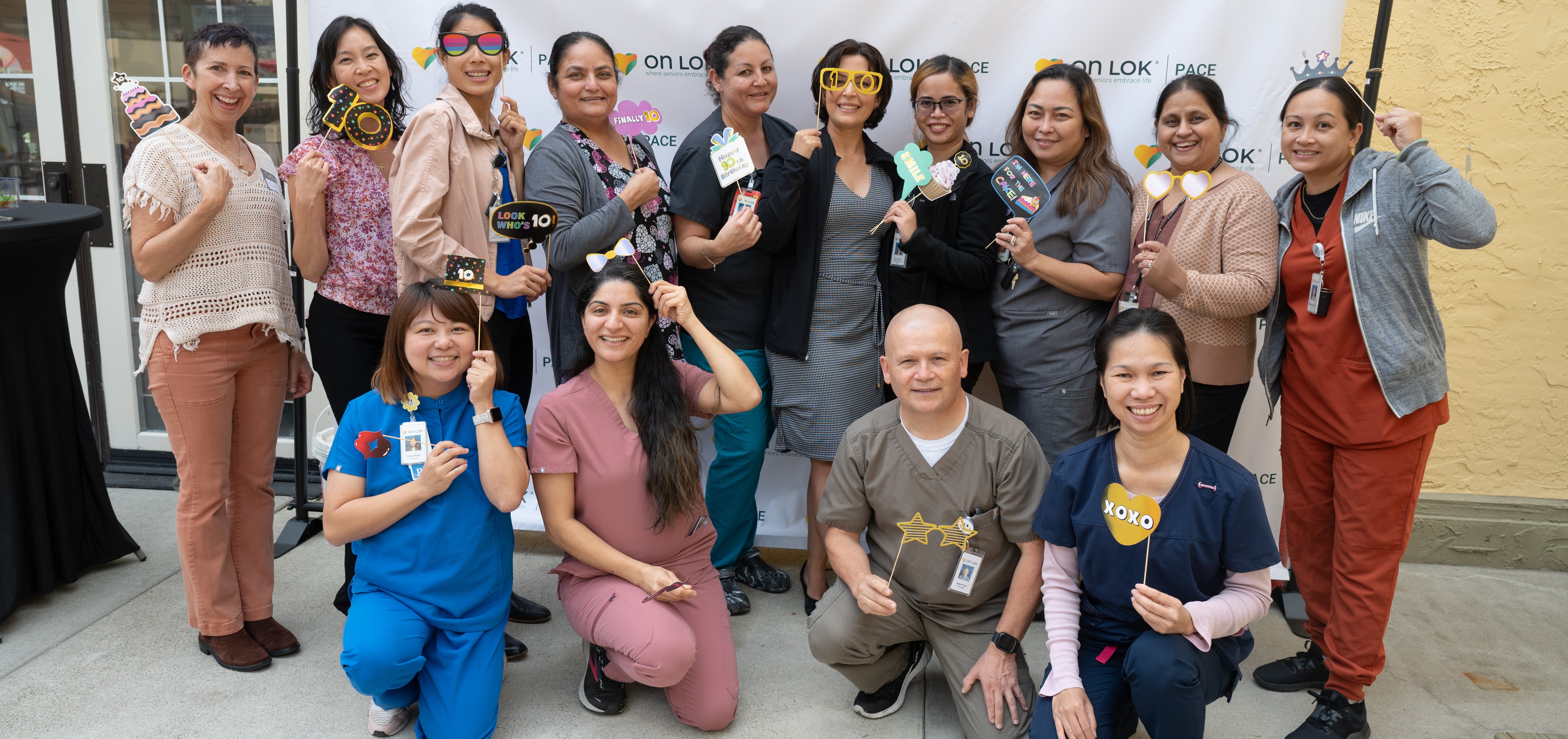 Image of On Lok employees at the 10th anniversary celebration.