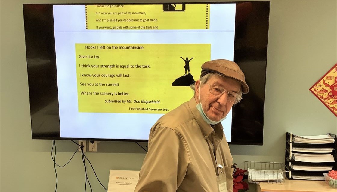 Image of a participant, Don, who gave a presentation on Sign Language and shared insights with peers at the On Lok PACE San Jose Center. The image shows Don with the presentation PowerPoint as the background. 