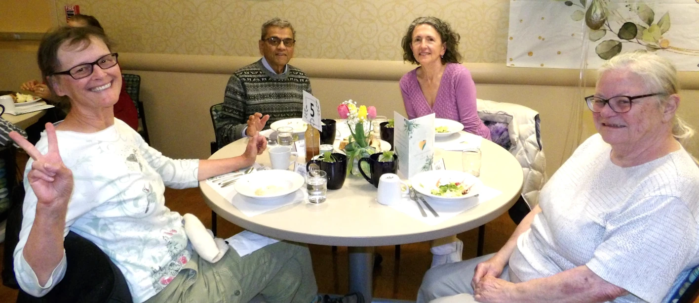 Seniors enjoying a meal at On Lok 30th Street Senior Center.