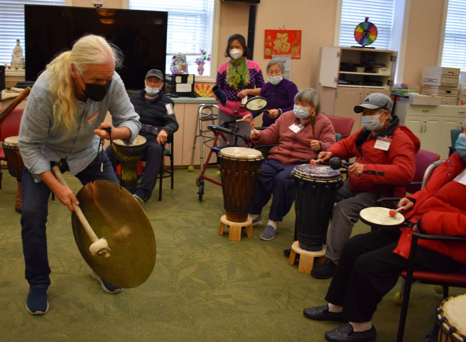 Daniel Hirtz drumming with San Francisco seniors for wellness.