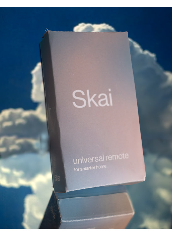 Skai Product Packaging: Image Of An Actual Product Packaging I Printed Out Of Cardboard, Folded Into Shape By Following My Dielines. I Create The Product Photo With A Mirror Where I Placed The Product Box On Top. The Backdrop Of The Image Is A Cloudy Skyline, That Plays On Words With The Product Name "Skai".