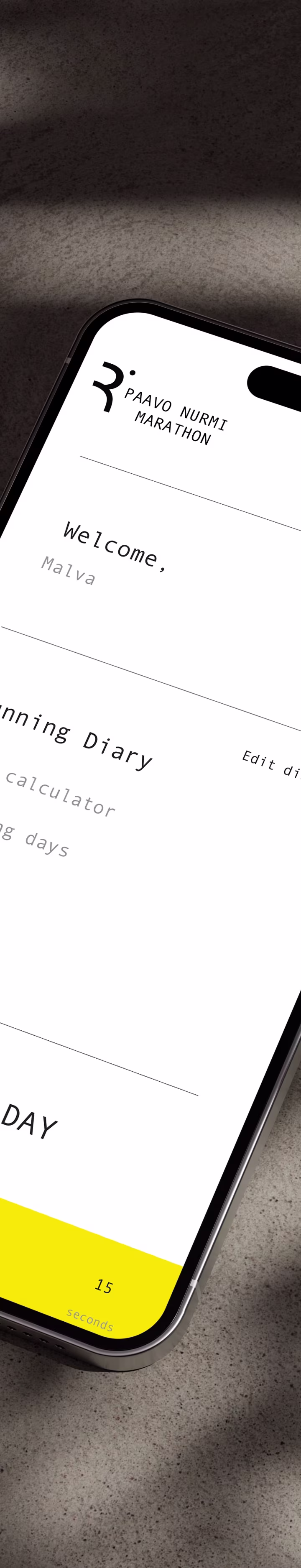 Paavo Nurmi Marathon Mobile App Interface: Smartphone Displaying Paavo Nurmi Marathon App Interface With Running Diary And Race Day Options, PNM Logo Visible.