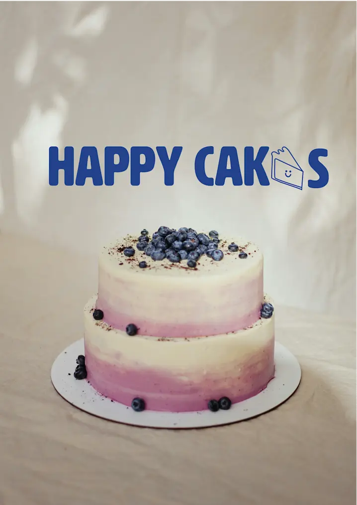 Image Of A Big Festive Cake, Covered In Icing And Blueberries. In The Top Is Reads HAPPY CAKE Where The "E" In CAKE Has Been Replaced With Simple Drawing Of A Slice Of Cake With Smiley Face. Text Is Blue And The Other Colors In The Photo Are Neutral Beige And Soft Pink. 