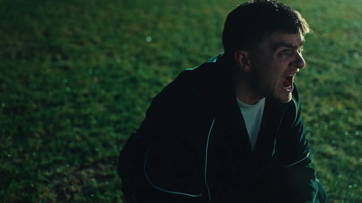 Cinematic night scene football field emotional performance music video production Europe EMPIRE Film