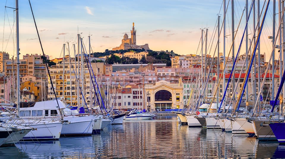 The old Vieux Port of Marseilles beneath Cathedral of Notre Dame