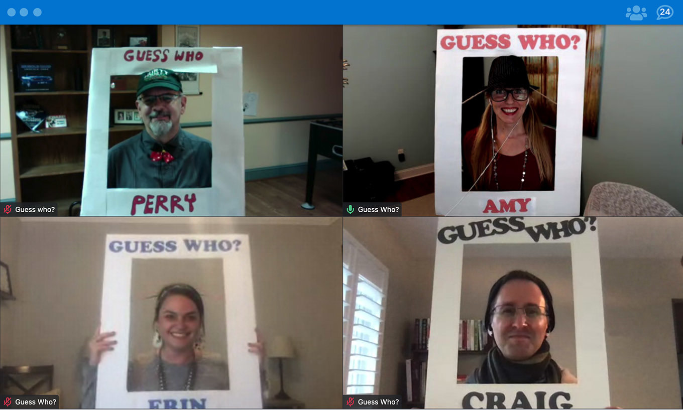 A group from Customer Success play real-life Guess Who? | Photo by Aha!