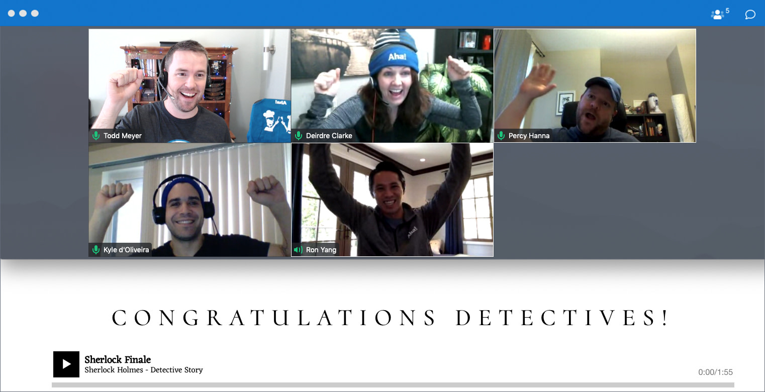 A group of Aha! detectives celebrate cracking the case as part of a virtual game.
