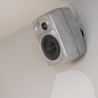 RAW AV Genelec mounted to a wall
