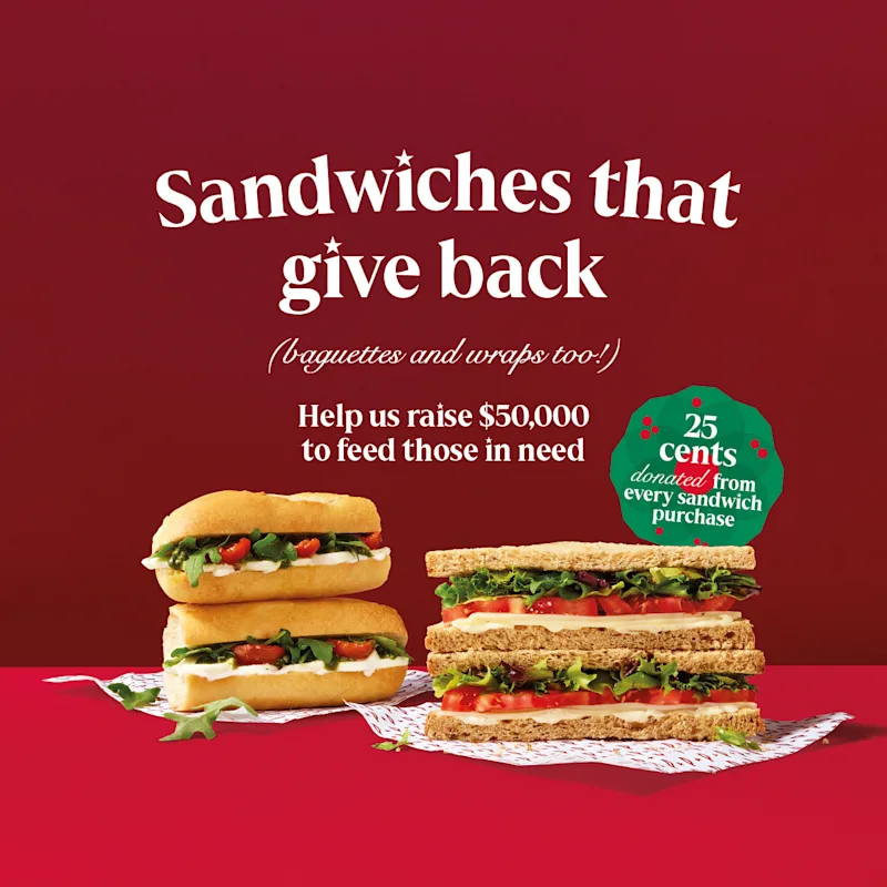 Two pairs of sandwiches underneath text: "Sandwiches that give back - help us raise $50,000 to feed those in need"