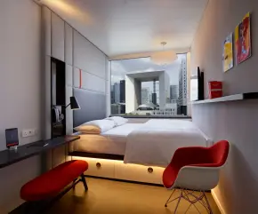 xl bed with view of the Grande Arche