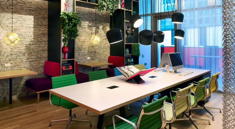 image of a coworking table in citizenM Austin Downtown