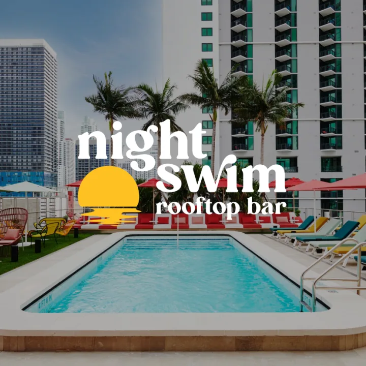 Miami rooftop pool area with night swim rooftop bar branding
